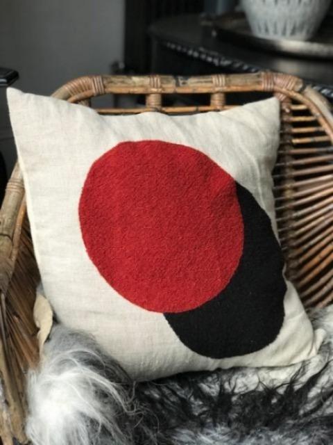 Circles embroidered cushion