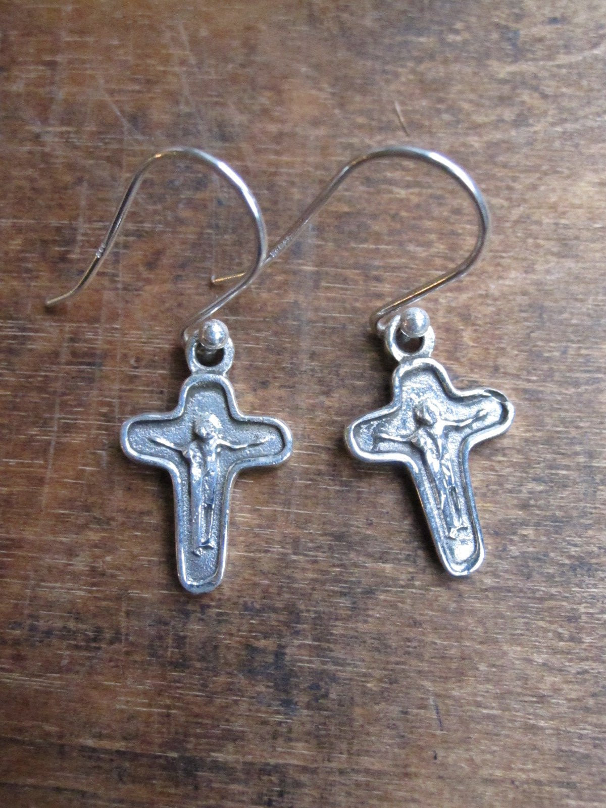 WDTS Jesus on the cross earrings.