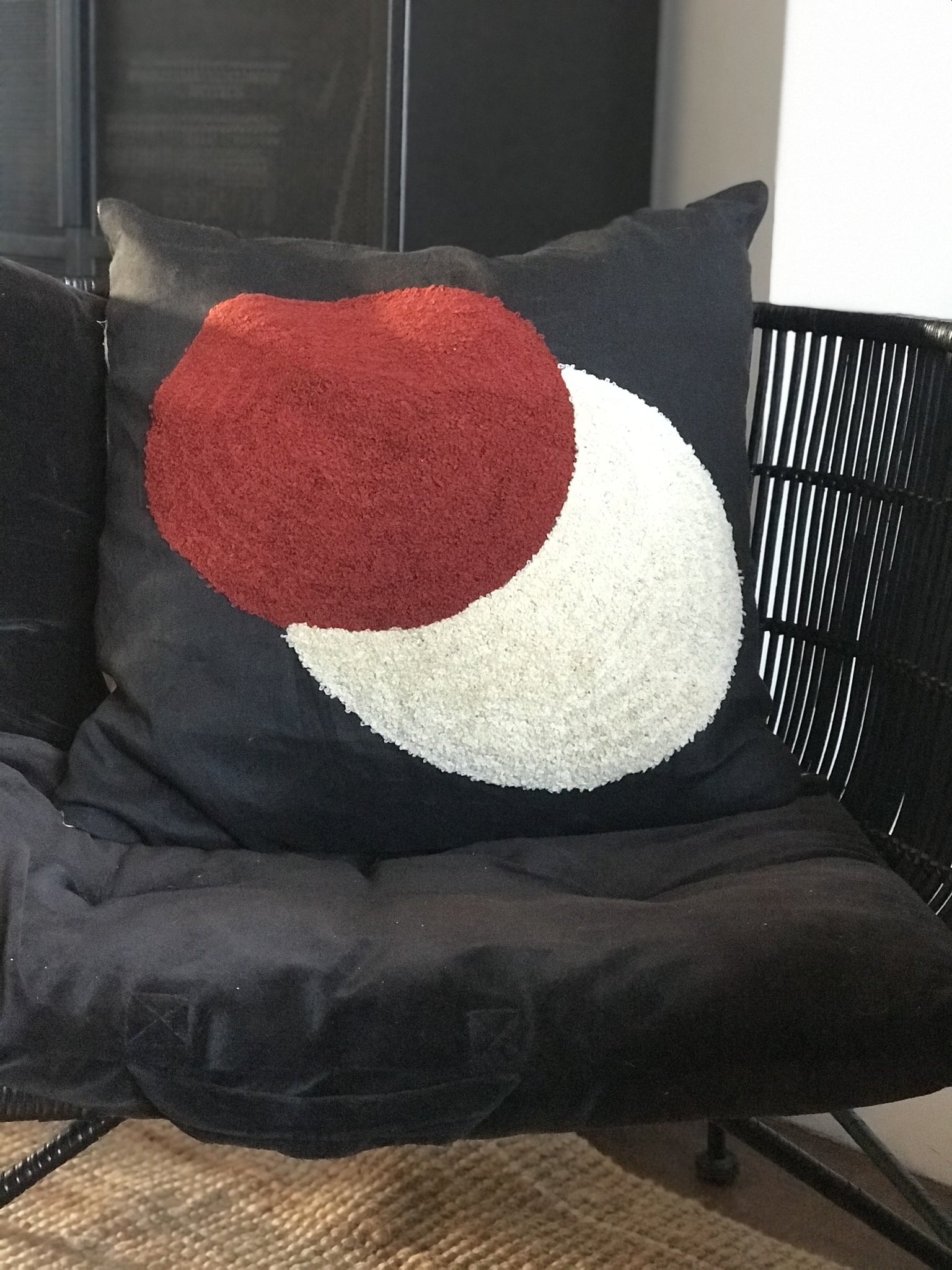 Circles embroidered cushion - black